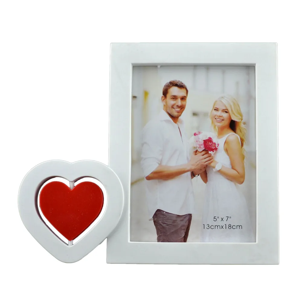 Rama foto din plastic - Dim. poza 13x18 cm - Decorata cu inimioara rotativa - imagine 2